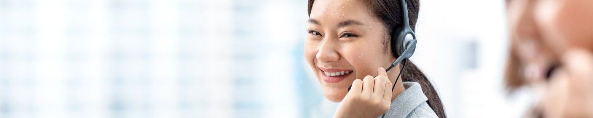 customer support woman smiling in labor consulting services