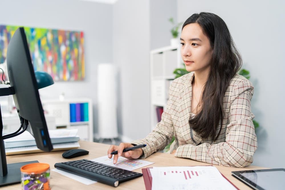 Professional accountant looking at Manpower Vietnam's Payroll Services